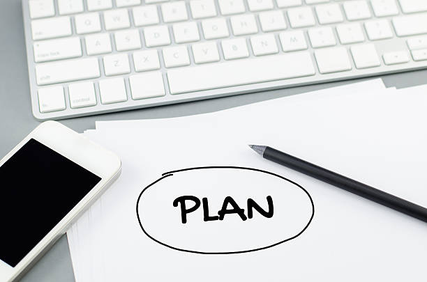 istock Plan buble on paper with pencil and smart phone 471545766
