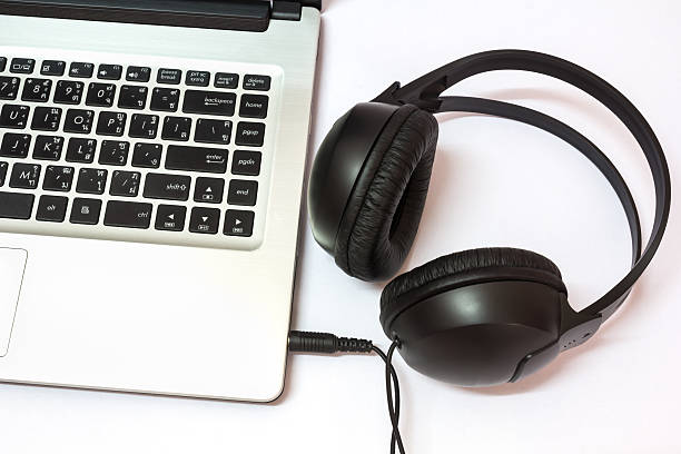 istock Laptop with headphones 471546027