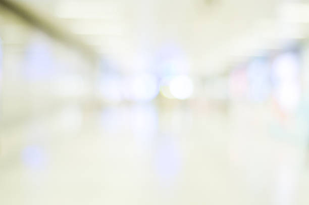 istock Blur inside office building with bokeh light background, busines 471546054