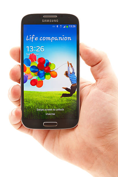 samsung galaxy s4 - s4 samsung galaxy samsung group human hand stock-fotos und bilder