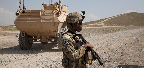 Kabul, Afghanistan - May 13, 2013: Afghan National Army (ANA) Soldiers, belonging to the 1st MSF (Mobile Strike Force) conduct recovery training with U.S. Soldiers and contractors on the Mobile Strike Force Vehicle (MSFV)