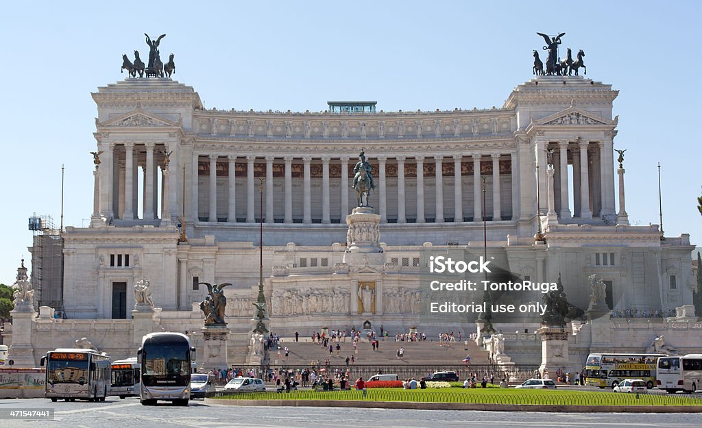 Monument of Vittorio Emanuele II in Rome Rome, Italy - August 8, 2012: Monument of Vittorio Emanuele II in Piazza Venezia with crowds and traffic surrounding it. Altare Della Patria Stock Photo