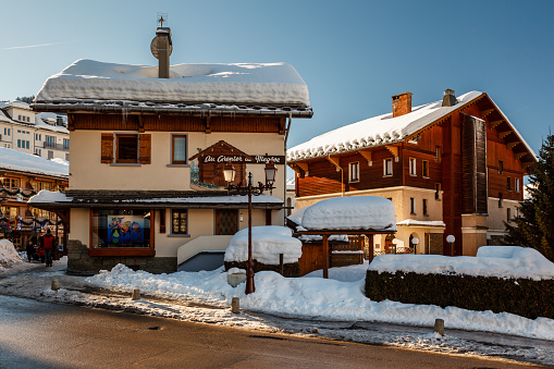 MEGEVE, France - January 10, 2012: Evening in the Village of Megeve in French Alps, France. Megeve with a population of over 4,000 residents is well-known due its popularity as a ski resort.