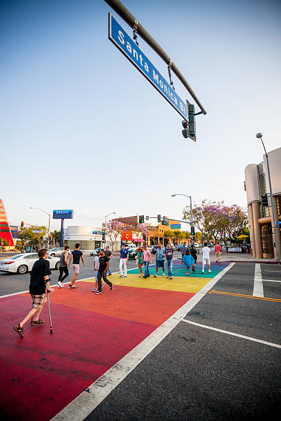 as pessoas atravessam a rua em west hollywood - editorial vertical homosexual people imagens e fotografias de stock