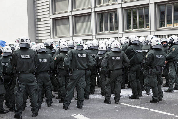 Frankfurt, Germany - June 1, 2013: A riot police cordon during Blockupy 2013 demonstration in the city center of Frankfurt.