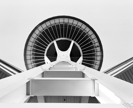 Seattle, Washington - January 8, 2011: A view of the Space Needle in Seattle looking straight up at the observation deck from the base of the structure. The Space Needle is one of the architectural landmarks identified with the Seattle skyline. The futuristic structure stands 605 feet tall and was originally built for the 1962 World's Fair.