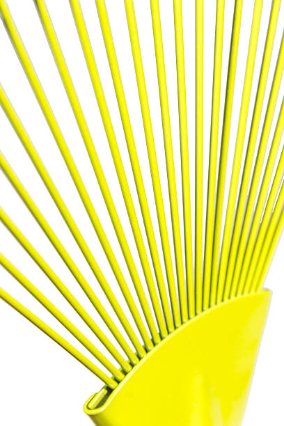 istock Yellow fan rake isolated white background 471548846