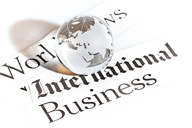 istock crystal globe and newspaper cut outs 471550220
