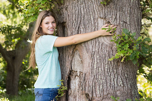 istock Woman using laptop in park 471551474