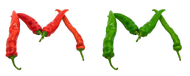 istock Letter M composed of green and red chili peppers 471551806