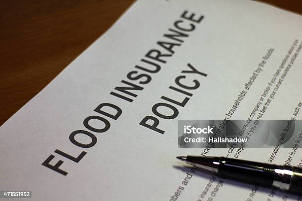 Flood Insurance Policy Document Stock Photo - Download Image Now - Flood, Insurance, Claim Form