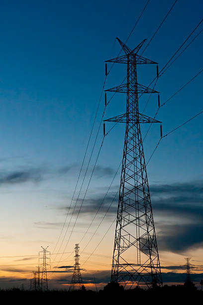 istock Electricity pylons in twilight time 471552705