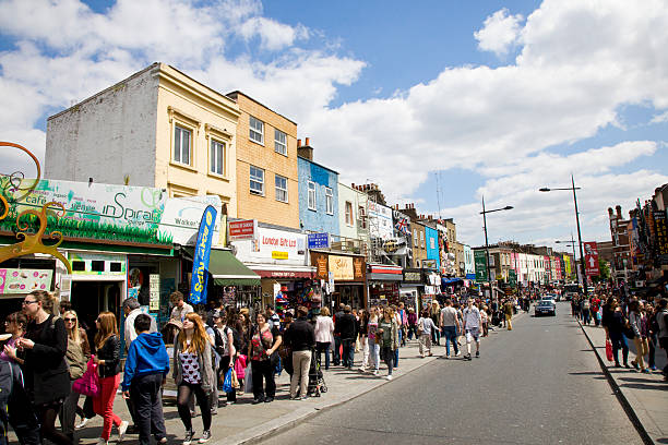 London, UK - 2 June 2013: The high street in Camden Town, north central London, shows the colorful shops and people of the popular area. 