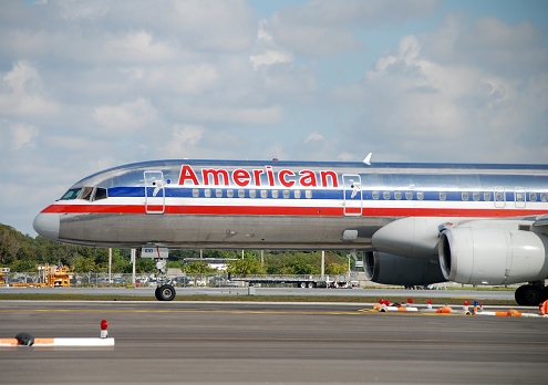 Fort Lauderdale, USA - December 7, 2007: American Airlines Boeing 757 passenger jet departs from Fort Lauderdale, Florida. American has started a rebranding effort with new color scheme.