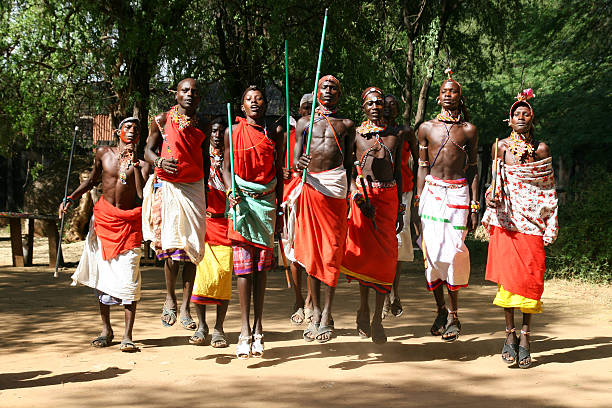 african tribe - masai africa dancing african culture stock-fotos und bilder