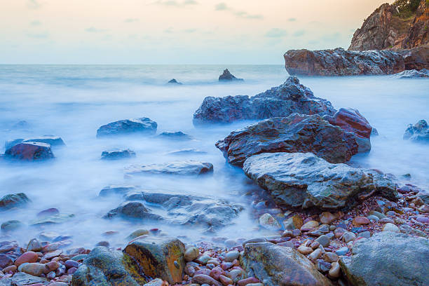 istock Seascape of evening wave with rock and cloud blue sky 471555070