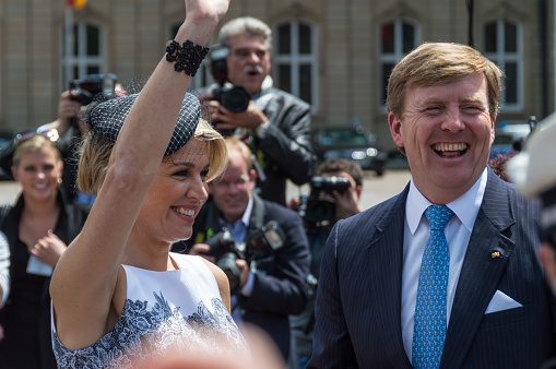 Stuttgart, Germany - June 4, 2013: King Willem-Alexander and Maxima of the Netherlands visit at the end of their visit to Germany, the Stuttgart New Castle (Neues Schloß) and received enthusiastically by hundreds of people.