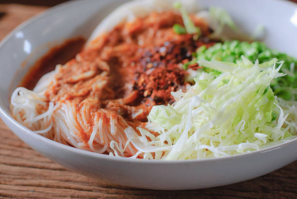 istock Thai rice vermicelli served with curry 471556104