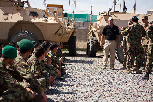 Kabul, Afghanistan - May 6, 2013: Afghan National Army (ANA) Soldiers, belonging to the 1st MSF (Mobile Strike Force) participate in a class taught by US Soldiers and contractors on the MSFV (Mobile Strike Force Vehicle)
