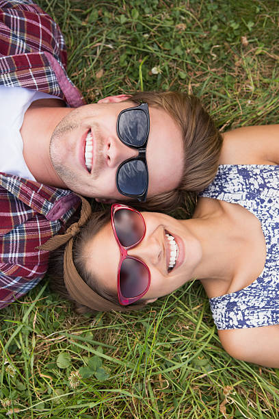 istock Couple relaxing in the park 471556632