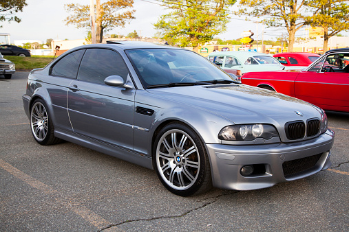 Dartmouth, Nova Scotia, Canada - June 6, 2013: A BMW M3 E46 parked in a parking lot.  In background, some other cars are visible.  The E46 M3 was first introduced in 2000 and features 333 HP from a 3.2 litre engine.  The BMW M3 is considered one of the best sports cars of all time and is a benchmark in sports performance.