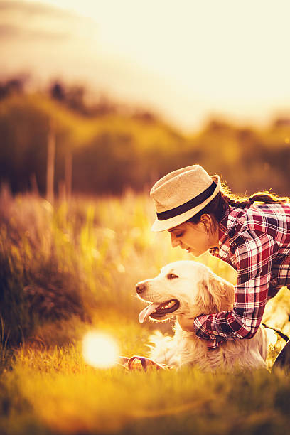 istock Woman and her dog 471558136