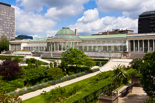 Brussels, Belgium - June 23, 2012: Botanical Garden of Brussels. It stands on Rue Royale near the Northern Quarter financial district in Brussels and was founded in 1826.  The main orangery (Le Botanique) is composed of a central rotunda with a dome and designed by architect Tilman-François Suys.