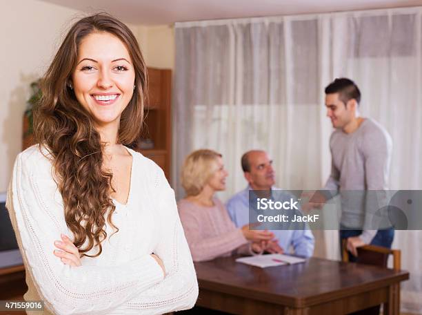 Guy And Big Family With Agent Stock Photo - Download Image Now - 2015, 60-64 Years, Adult