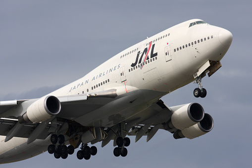 Vancouver, Canada - October 3, 2007: A Japan Airlines 747-400 leaving Vancouver International Airport.  Based in Tokyo Japan, JAL flies to 220 destinations in 35 countries worldwide.