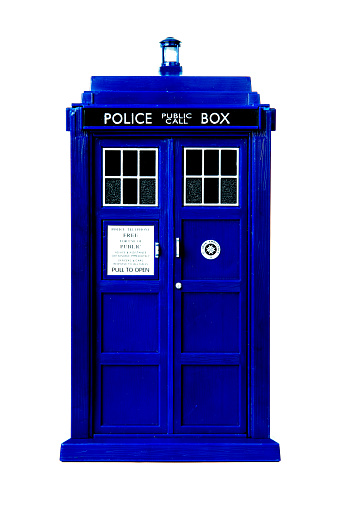 Police call box notebook isolated on wall background. Tardis from Doctor Who. Space for text.