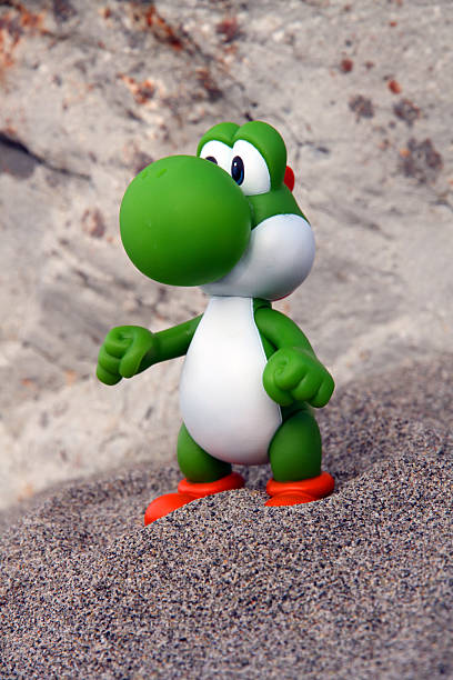 Yoshi On The Sand Stock Photo - Download Image Now - Animal