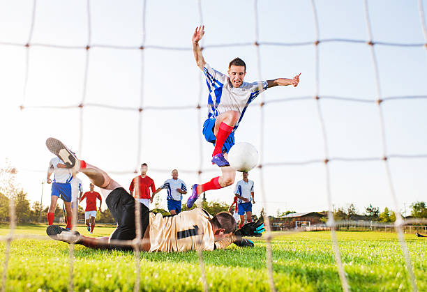 istock Soccer match from the goalkeeper's net. 471561926