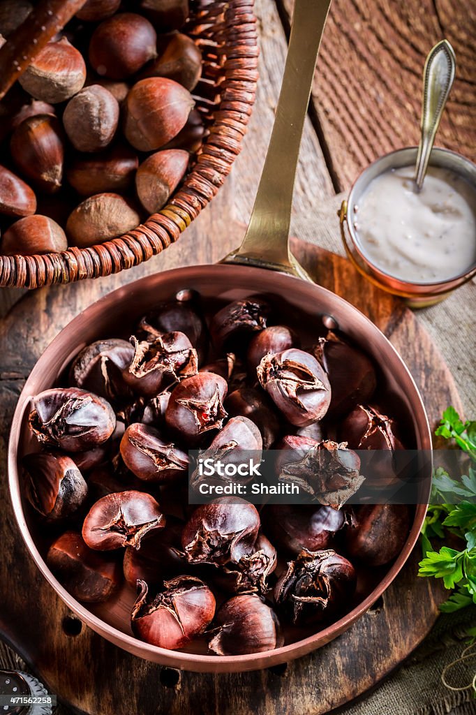 Roasted chestnuts with parsley Roasted chestnuts with parsley. 2015 Stock Photo