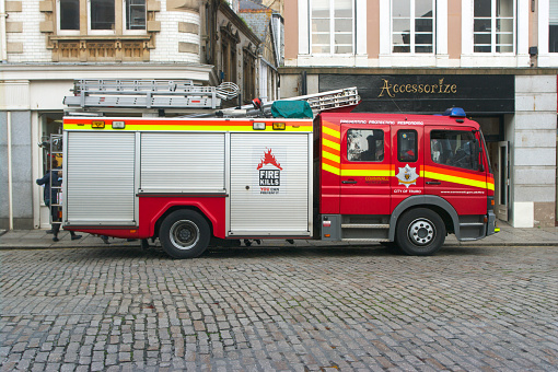 Truro, Cornwall, UK - October 18, 2011: A City Of Truro fire appliance parked outside buildings in Boscawen Street.