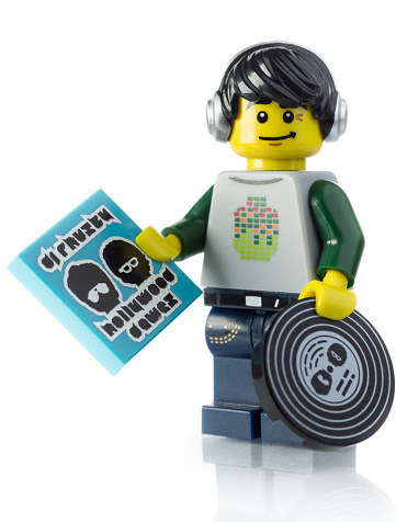 Virginia, USA - June 10, 2013: Close-up of a Lego DJ mini-figure from Series 8 complete with headphones and music album. Lego is a famous toy produced by the Danish company Lego Group. Mini-figures were first produced in 1978. The modern Lego brick was patented in 1958
