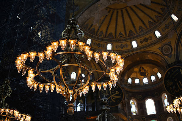 istock Old beautiful chandelier hanging under the dome 471563456