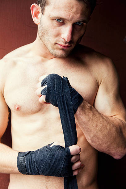 istock Male Boxer Wrapping Wrists 471563695