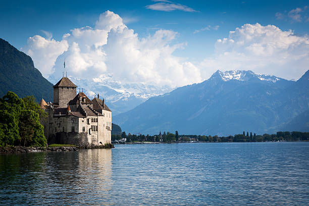 Chateau Chillon, Montreux, Switzerland Montreux, Switzerland - June 5, 2013: Chateau Chillon, Montreux, Switzerland.  The Chateau de Chillon (Chillon Castle) is located on the shore of Lake Leman, at the eastern end of the lake, 3km from Montreux, Switzerland. The castle consists of 100 independent buildings that were gradually connected to become the building as it stands now. chateau de chillon photos stock pictures, royalty-free photos & images