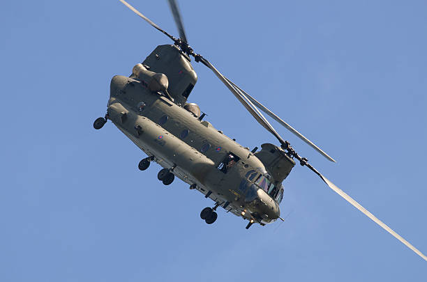 A US Air Force Boeing CH-47 Chinook from the 101st Airborne Division leaving the scene of an air attack demonstration commemorating Operation Market Garden in The Netherlands