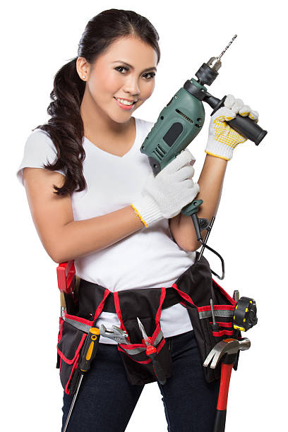 istock pretty young woman construction worker 471566258