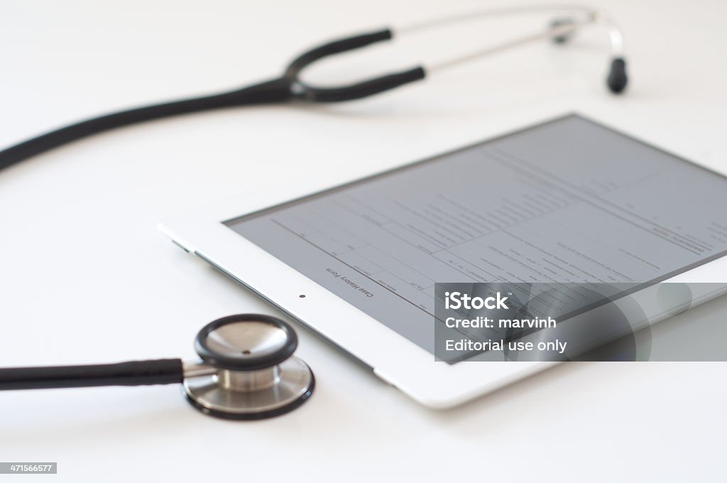 L'histoire de cas sur iPad 4 - Photo de Docteur libre de droits