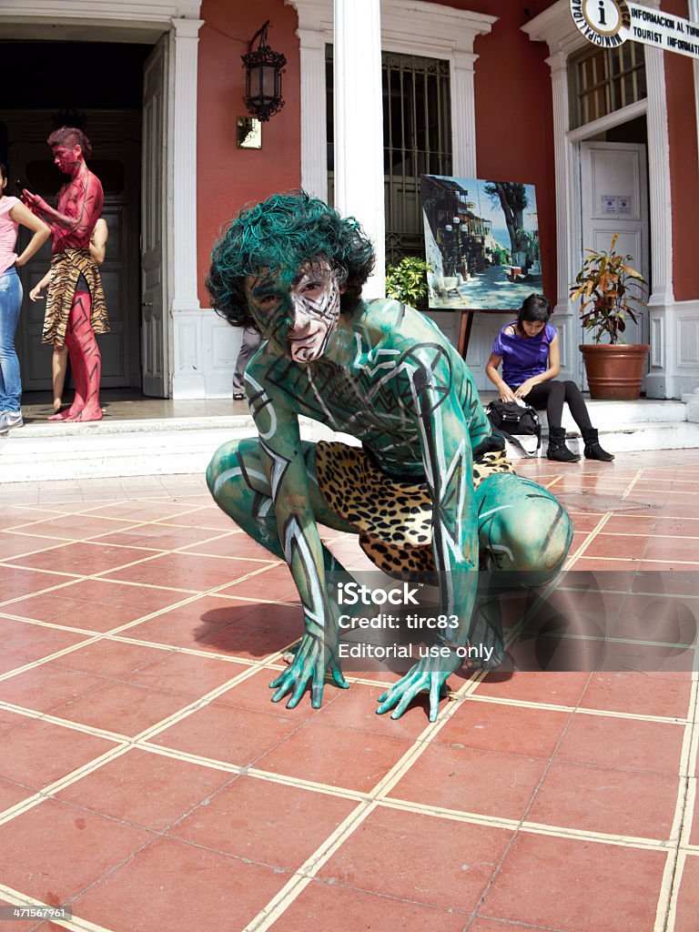 Peruvian Street Dancer In Green Body Paint Stock Photo - Download Image Now  - Adult, Clothing, Color Image - iStock
