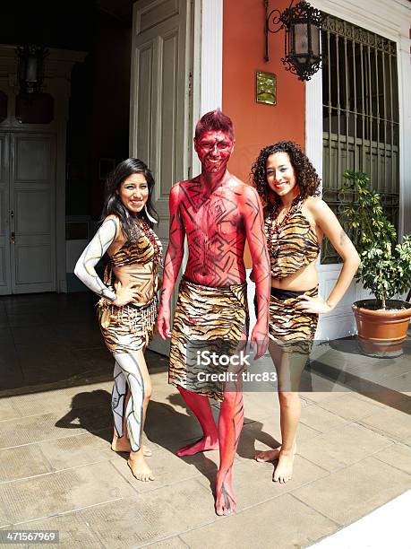 Peruvian Street Dancers In Red Body Paint Stock Photo - Download Image Now - Adult, Adults Only, Clothing