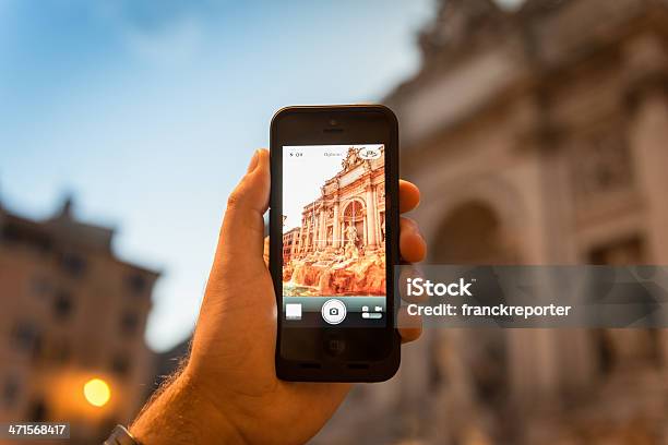 Photographing The Trevi Fountain In Rome Stock Photo - Download Image Now - Photography, iPhone, Apple Computers