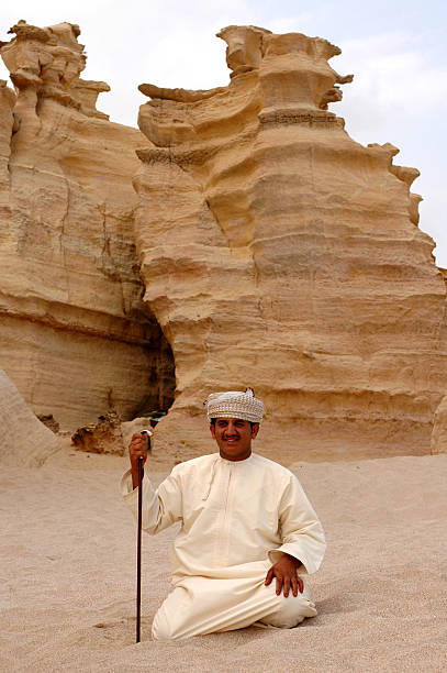 Omaní hombre con su caña - foto de stock