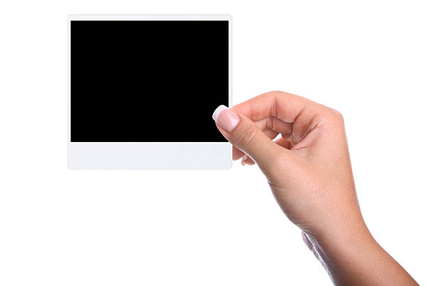 istock Hand holding a blank photo (Isolated) 471568775