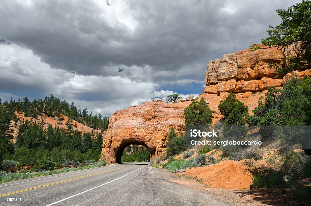 road in Red Canyon road and arc rocks in Red Canyon in Utah Asphalt Stock Photo