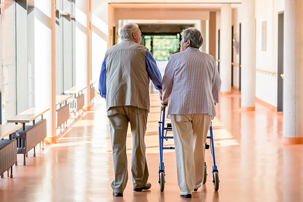 Senior couple with walking frame stock photo