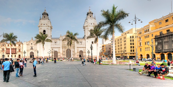 Lima, Peru - May 17, 2013: View of the Monasterio de San Francisco in the city centre of Lima in Peru. Pedestrians are pictured as well as the building facade