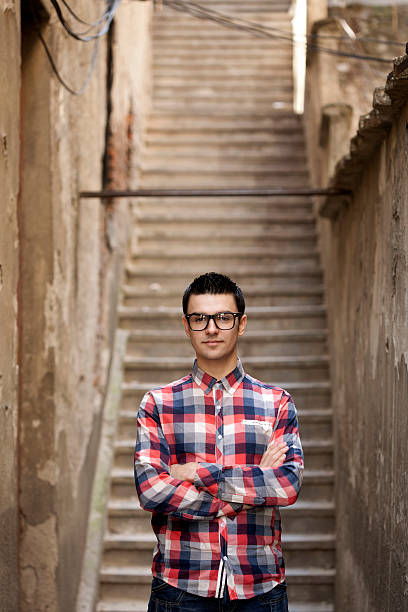 istock young man standing outdoor 471575589